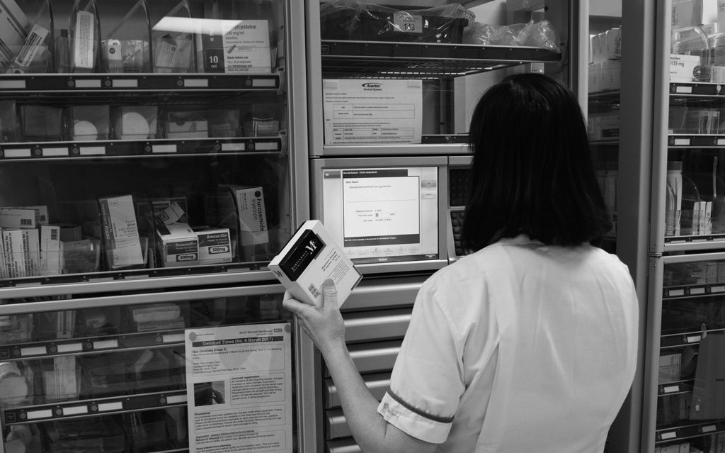 Nurse picking up a medicine in the XT ADC