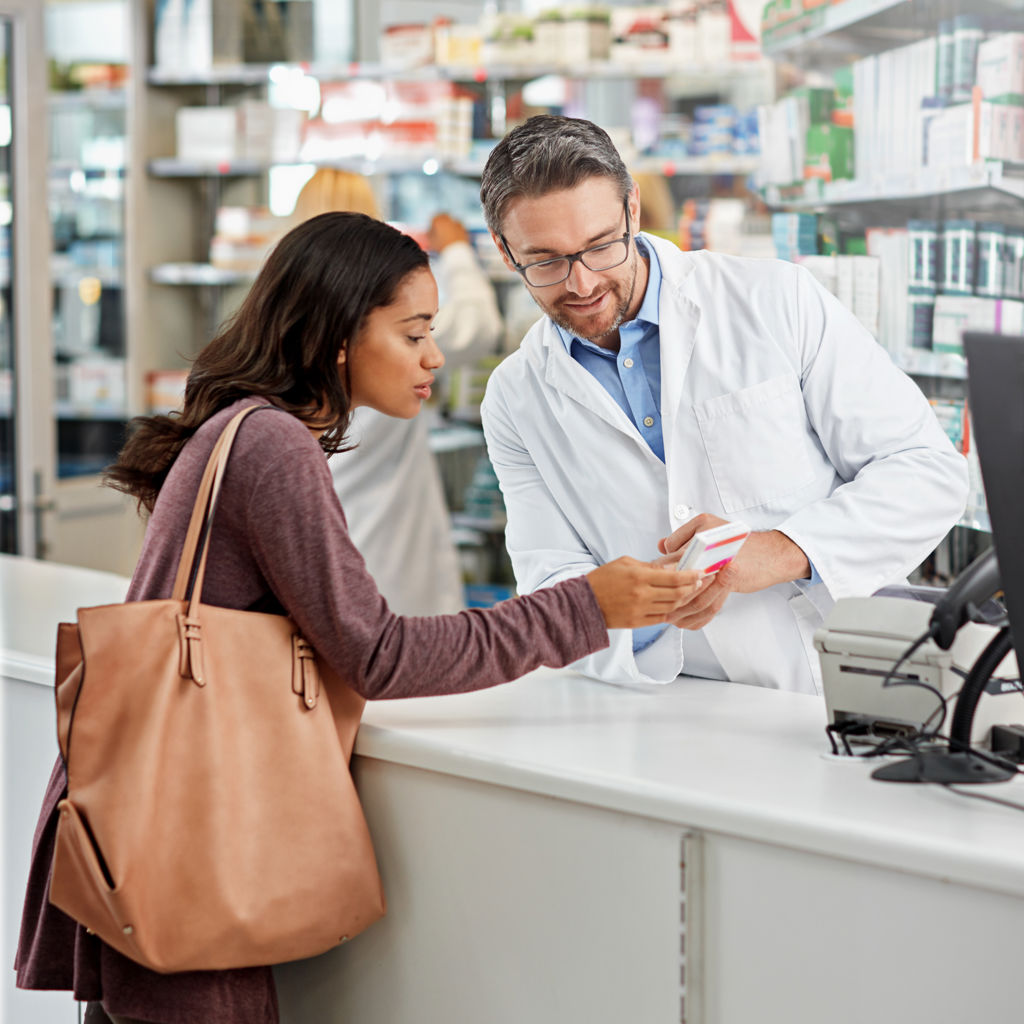 Patient showing the medicine to the Pharmacist